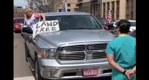 Colorado medics block protesters fighting against lockdown orders in tense showdown