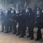 Colorado Police Officers Under Investigation Over Photos At Elijah McClain Memorial