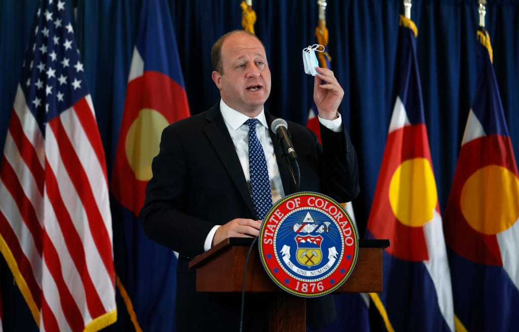 Colorado governor stands firm against issuing statewide mask mandate