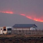 Colorado wildfire forces new evacuations as firefighters 'praying we get a lot of snow'