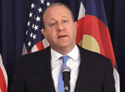 Polis ‘confident’ that Colorado will have summer that’s ‘close to normal,’ with scaled-down masking