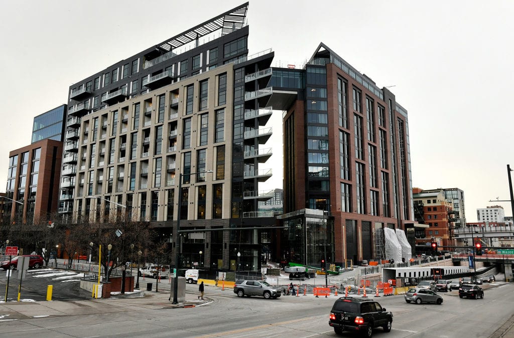 Dick Monfort says the Colorado Rockies and McGregor Square are separate entities, but the two share a common baseball seam