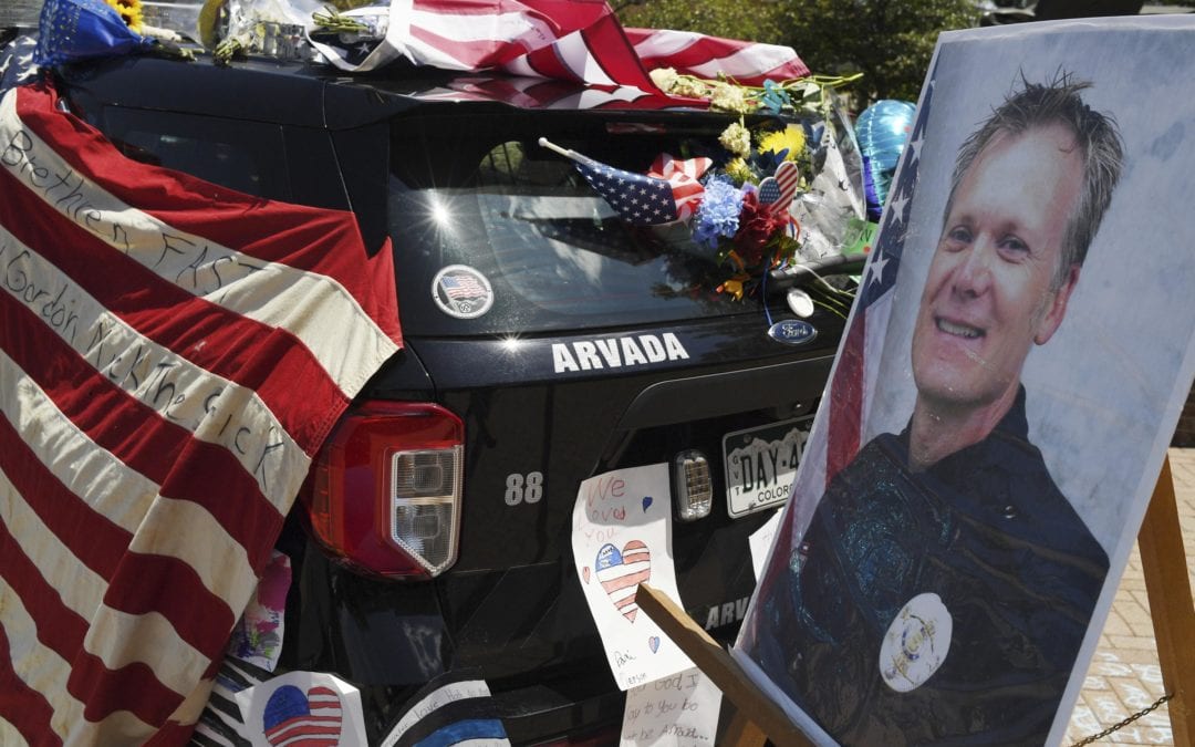 Police: Man who shot Colorado gunman was killed by officer