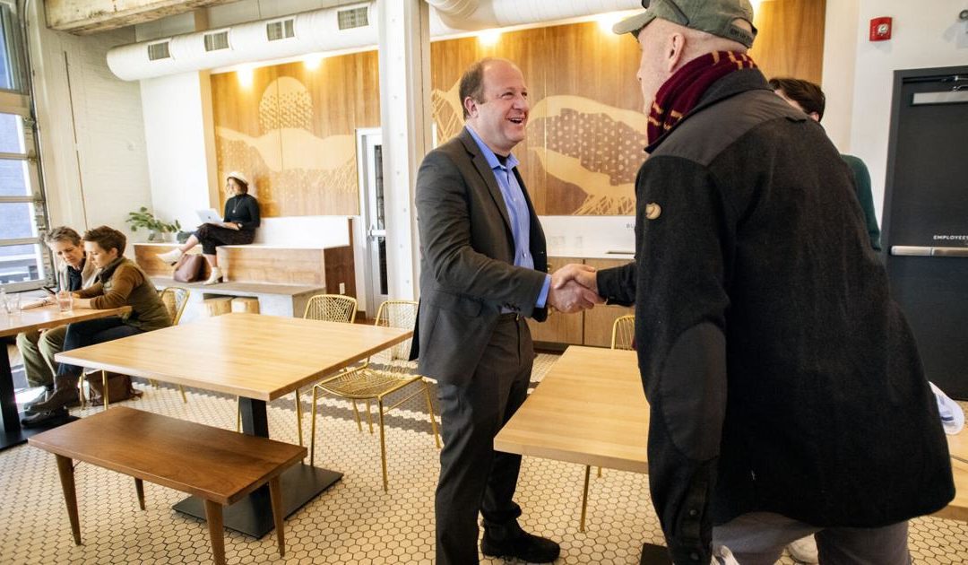 Gov. Polis visits Colorado Springs coffee shop during state tour
