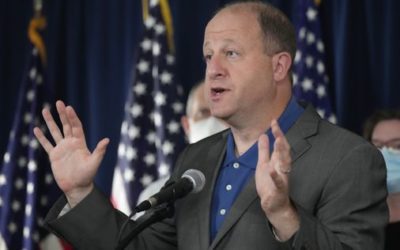 Colorado governor defies federal guidance, says all adults can get COVID-19 booster shot – The Boston Globe