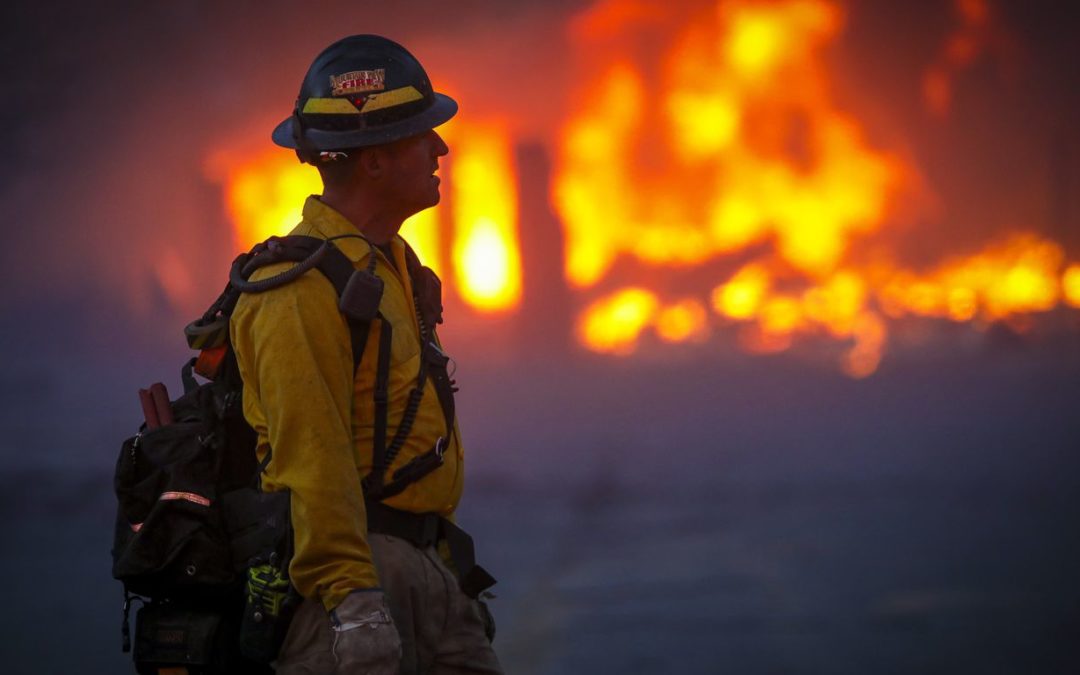 Fast-moving wildfires burn at least 580 homes in Colorado