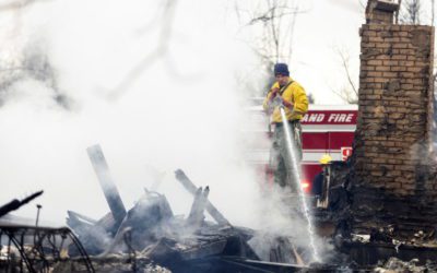 Authorities search for 2 missing in Colorado fire, investigating cause | PBS NewsHour